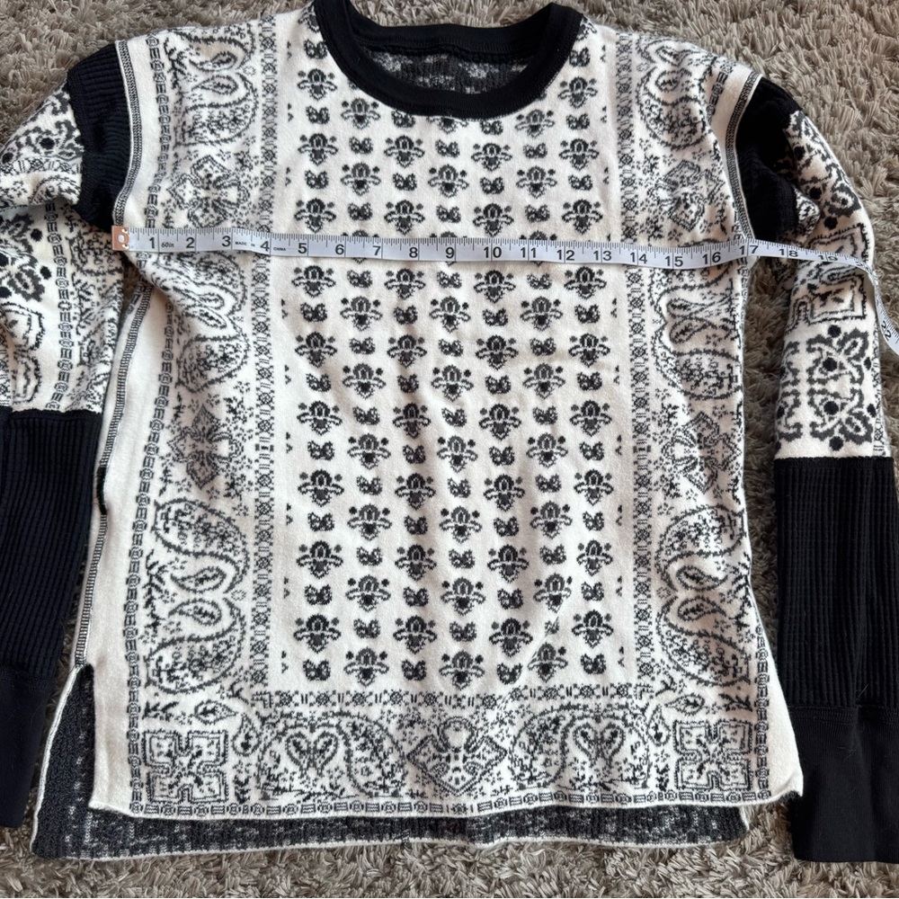 “Free People” reversible crew neck  black and white sweater small